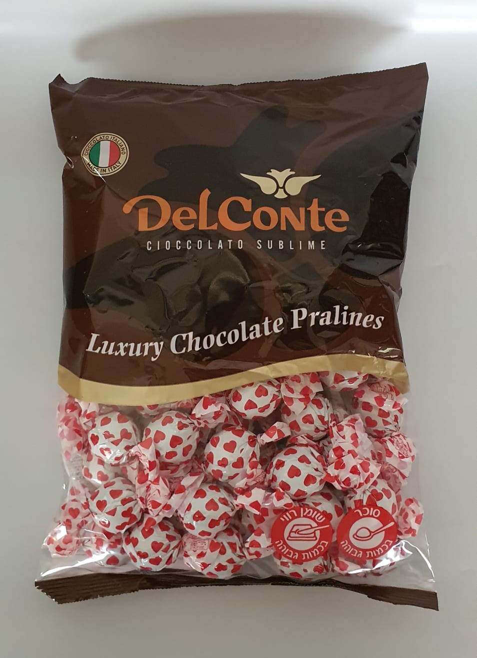 פרלין לבן לבבות אדומים בד"צ חלב ישראל חלב/קקאו 1 ק"ג 1/6