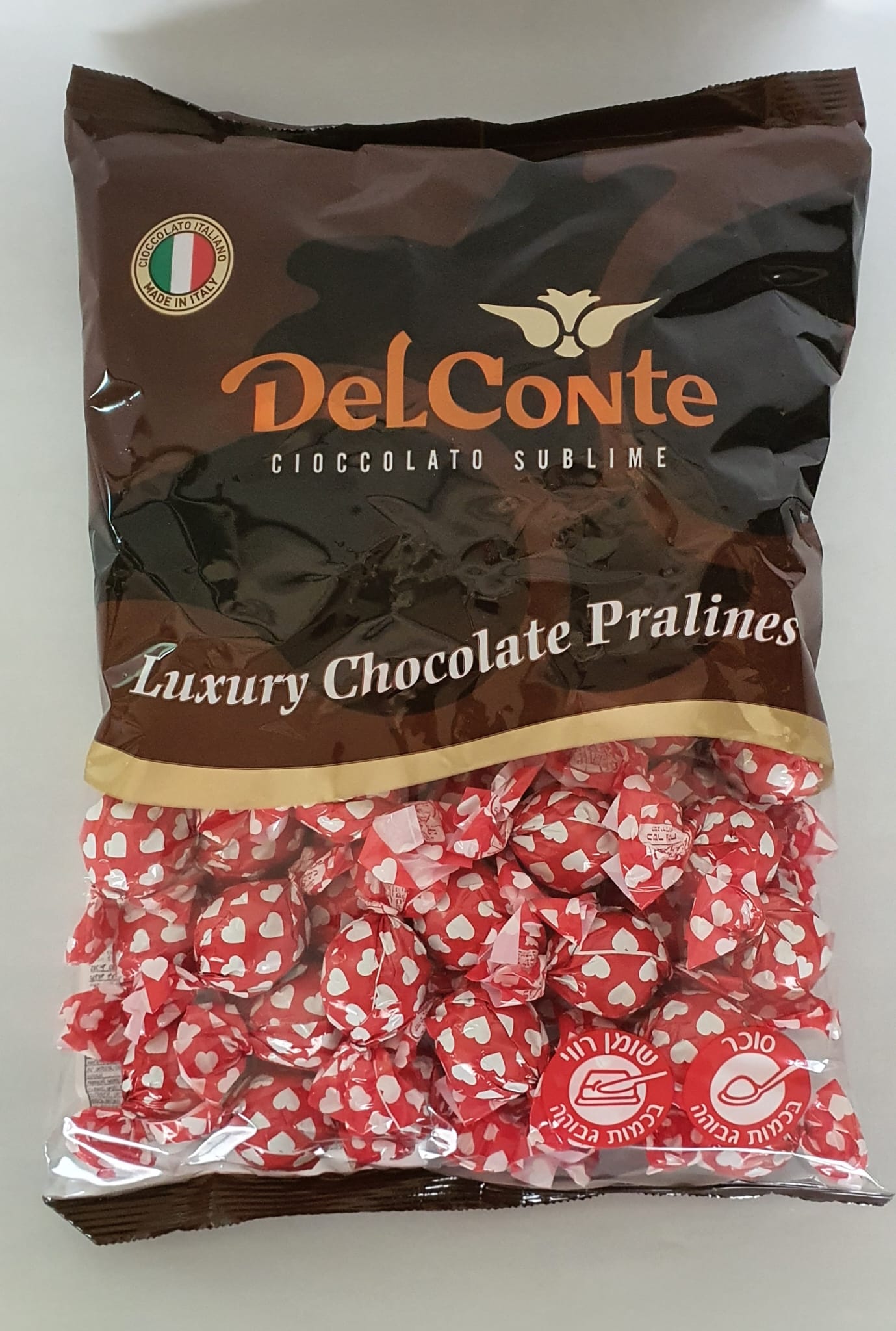 פרלין אדום לבבות לבנים בד"צ חלב ישראל חלב/קקאו 1 ק"ג 1/6